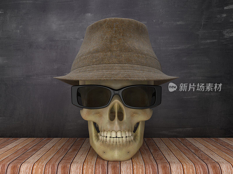 人类头骨与眼镜和帽子在黑板背景- 3D渲染